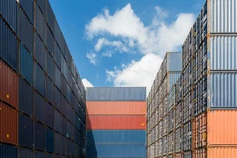 Stack of cargo containers at the docks use for import, export and logistics b Stock Photos