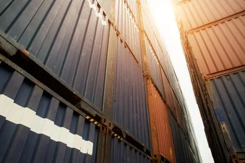 Stack of cargo containers at import and export area at port. Stock Photos