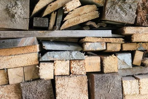A stack of carpentery waste using as firewood, sustainable, rational and Stock Photos