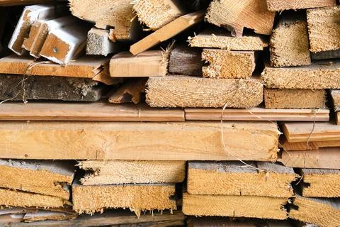 A stack of carpentery waste using as firewood, sustainable, rational and Stock Photos