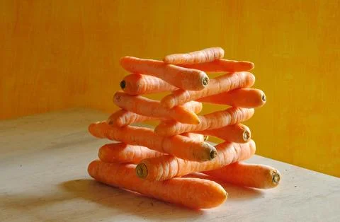 Stack of carrots with beautiful lighting, healthy eating, dirting,springtim.. Stock Photos
