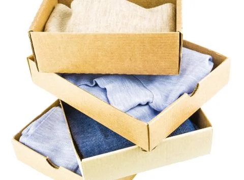 Stack of cartons with clothes Stock Photos