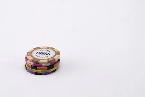 Stack of Casino Chips with 10000 Value on White Background, Gambling Concept. Stock Photos