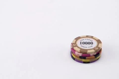 Stack of Casino Chips with 10000 Value on White Background, Gambling Concept. Stock Photos