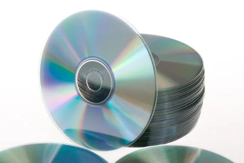 Stack of CDs and DVDs on a white background Stock Photos