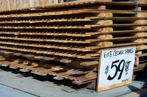 Stack of cedar stockade fence panels Stock Photos