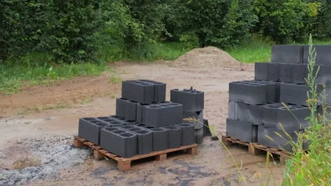 Stack of Ceiling Blocks Stored Outdoors at Residential Building Construction 動画素材 205577599