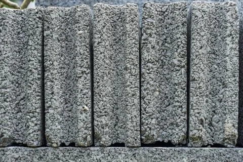 Stack of cement brick blocks close up texture background Stock Photos