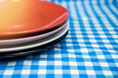 Stack ceramic plate or dish on table Stock Photos