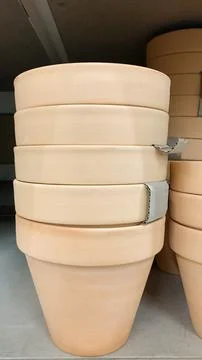 Stack of ceramic pots for home flowers Stock Photos