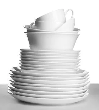 Stack of ceramic tableware on white background Stock Photos