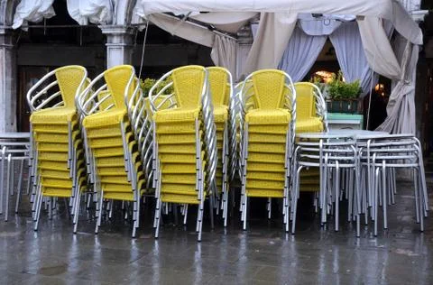 Stack of chairs and tables in the fall Stock Photos