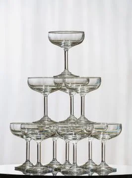 Stack of champagne glasses Stock Photos