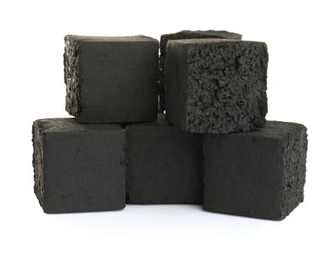 Stack of charcoal cubes for hookah on white background 스톡 사진