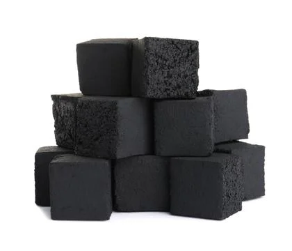 Stack of charcoal cubes for hookah on white background 스톡 사진