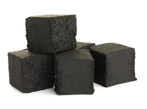 Stack of charcoal cubes for hookah on white background Stockfoto's
