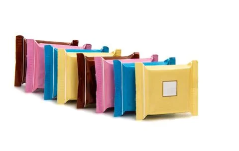 Stack of Chocolate Bars In Colorful Plastic Wrappers Stockfoto's