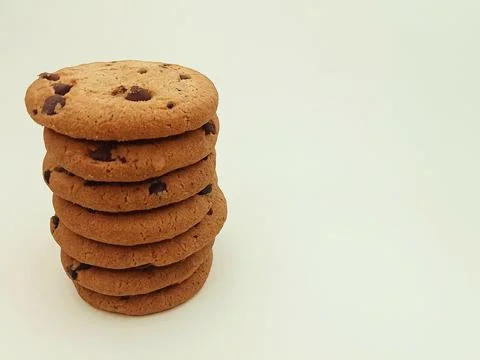 Stack of chocolate chip cookies isolated on white background Stock Photos