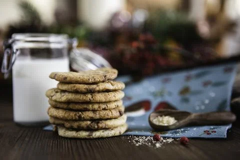 Stack of Chocolate chip cookies next to ingredients Stock Photos