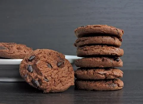 Stack of Chocolate Chip Cookies with Rustic Background 스톡 사진