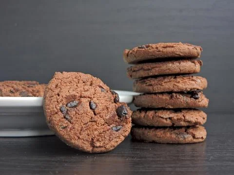 Stack of Chocolate Chip Cookies with Rustic Background 스톡 사진