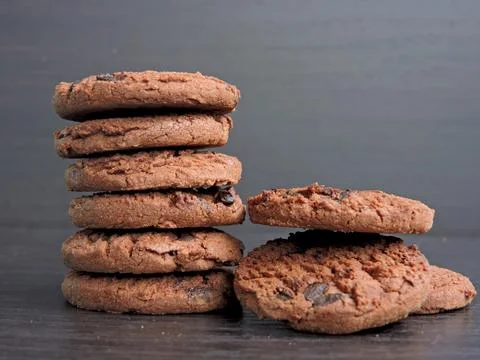 Stack of Chocolate Chip Cookies with Rustic Background 스톡 사진