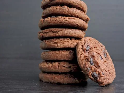 Stack of Chocolate Chip Cookies with Rustic Background 스톡 사진