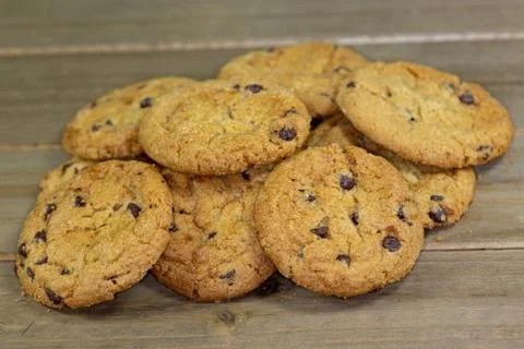 Stack of chocolate chip cookies waiting for the kids to eat them for desert Stock Photos