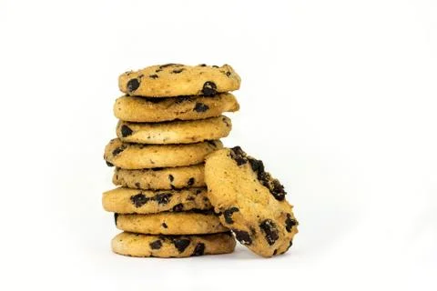 A stack of chocolate chip cookies on a white background. Stock Photos
