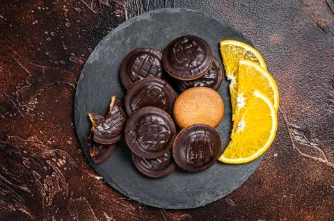 Stack of Chocolate Covered Round Jaffa Cookies with Orange Flavored Marmala.. Stock-Fotos