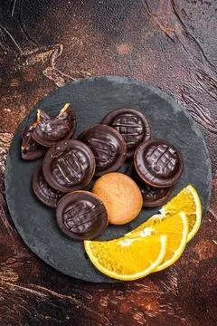 Stack of Chocolate Covered Round Jaffa Cookies with Orange Flavored Marmalade Fotos Stock