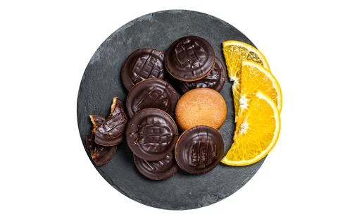 Stack of Chocolate Covered Round Jaffa Cookies with Orange Flavored Marmala.. Foto stock