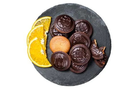 Stack of Chocolate Covered Round Jaffa Cookies with Orange Flavored Marmala.. Stockfoto's