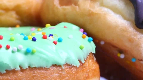 Stack of chocolate donuts on plate with copy space Stock Footage 146069525