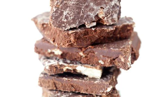 Stack of chocolate isolated on white Stock Photos