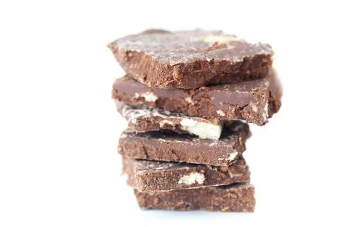 Stack of chocolate isolated on white Stock Photos