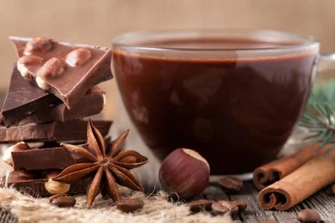 Stack of chocolate with nuts and coffee Stock Photos