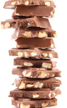  Stack of chocolate with nuts. Tasty morsel of milk chocolate with nuts Co... Stock Photos