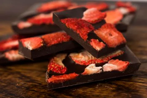 Stack of chocolate slices with strawberry Stock Photos