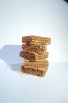 Stack of chocolate wafer on white background Stock Photos