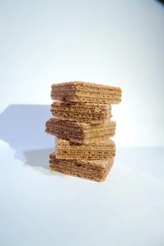 Stack of chocolate wafer on white background Stock Photos