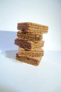 Stack of chocolate wafer on white background Stock Photos