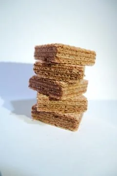 Stack of chocolate wafer on white background Stock Photos