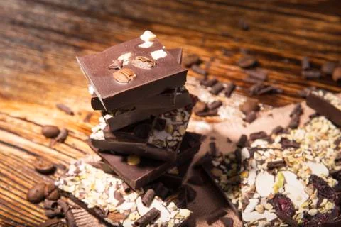 Stack of chocolate on a wooden background Stock Photos