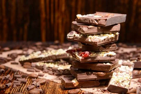 Stack of chocolate on a wooden background Stock Photos