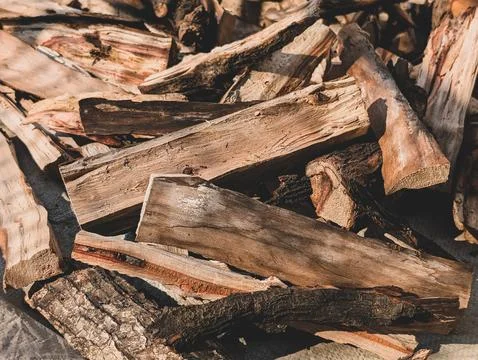 Stack of chopped firewood logs Stock Photos