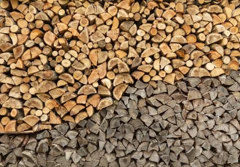 Stack of chopped firewood prepared for winter. wood background Stock Photos