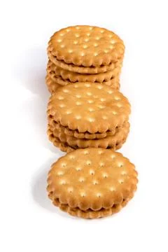 A stack of cicle biscuits puff sandwich cream isolated on white Stock Photos