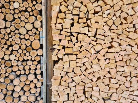 Stack of circular and rectangular firewood Stock Photos