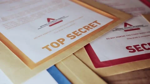 Stack of classified top secret folders and envelops with modern color labels Stock Footage 219872005